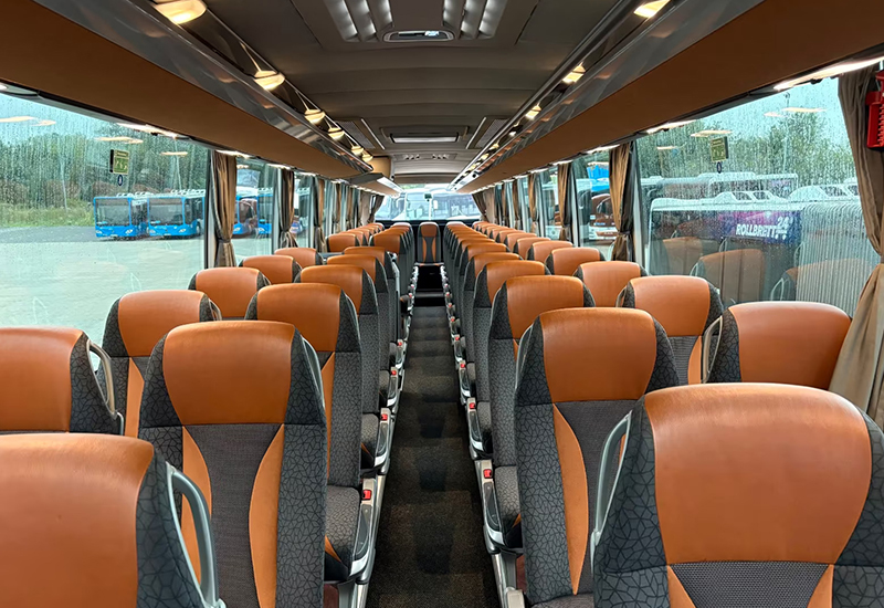 Setra coach cabin with orange and grey seats